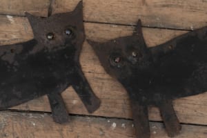 Pair of vintage cat bird scarers