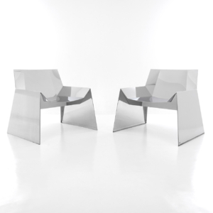 pair of Alaska armchairs by Cattelan Italia with makers mark