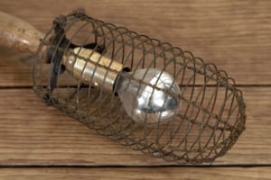 Antique industrial cage inspection lamp