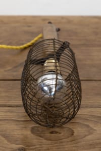 Vintage industrial cage inspection light