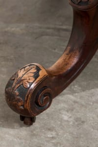 Antique Victorian walnut centre table with snap top and intricately carved legs