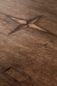 Antique peasant table with star inlay
