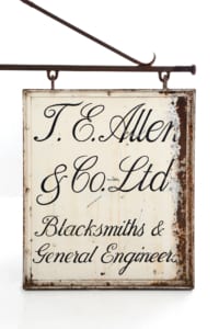 Original double sided cast iron shop sign