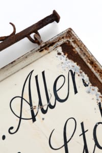 Double sided British antique shop sign