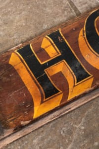 Antique wooden horses sign