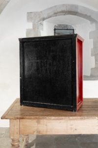 Mid Century red wooden cabinet