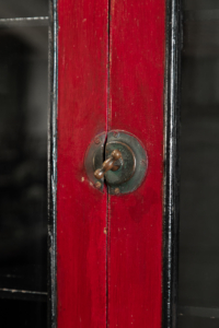 Original vintage red storage cabinet