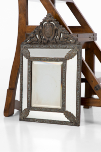 19th century French brass repoussé cushion wall mirror
