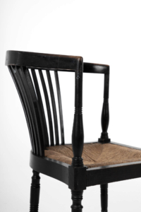 Arts and Crafts ebonised chair with rush seat