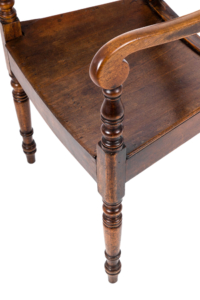 Antique early 19th century elbow chair in elm