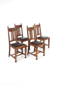 Arts and Crafts oak and leather dining chairs