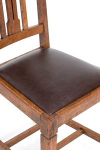Arts and Crafts chairs with leather seats