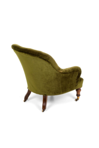 Victorian button back green velvet armchair