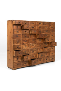 Antique bank of pine drawers