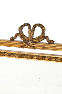 antique foxed mirror