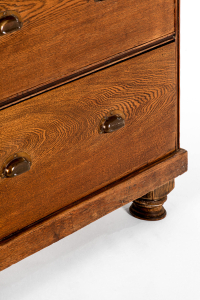 large bank of antique drawers