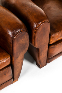 mid-century leather armchairs