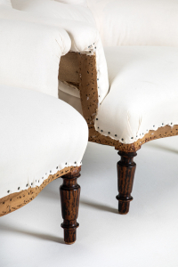 Pair of fishtail backed armchairs