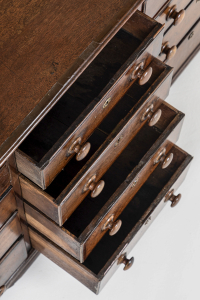large bank of antique drawers