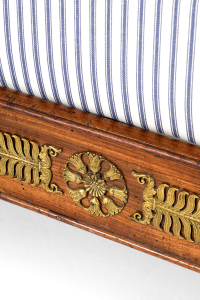 Antique sofa bed with stripes